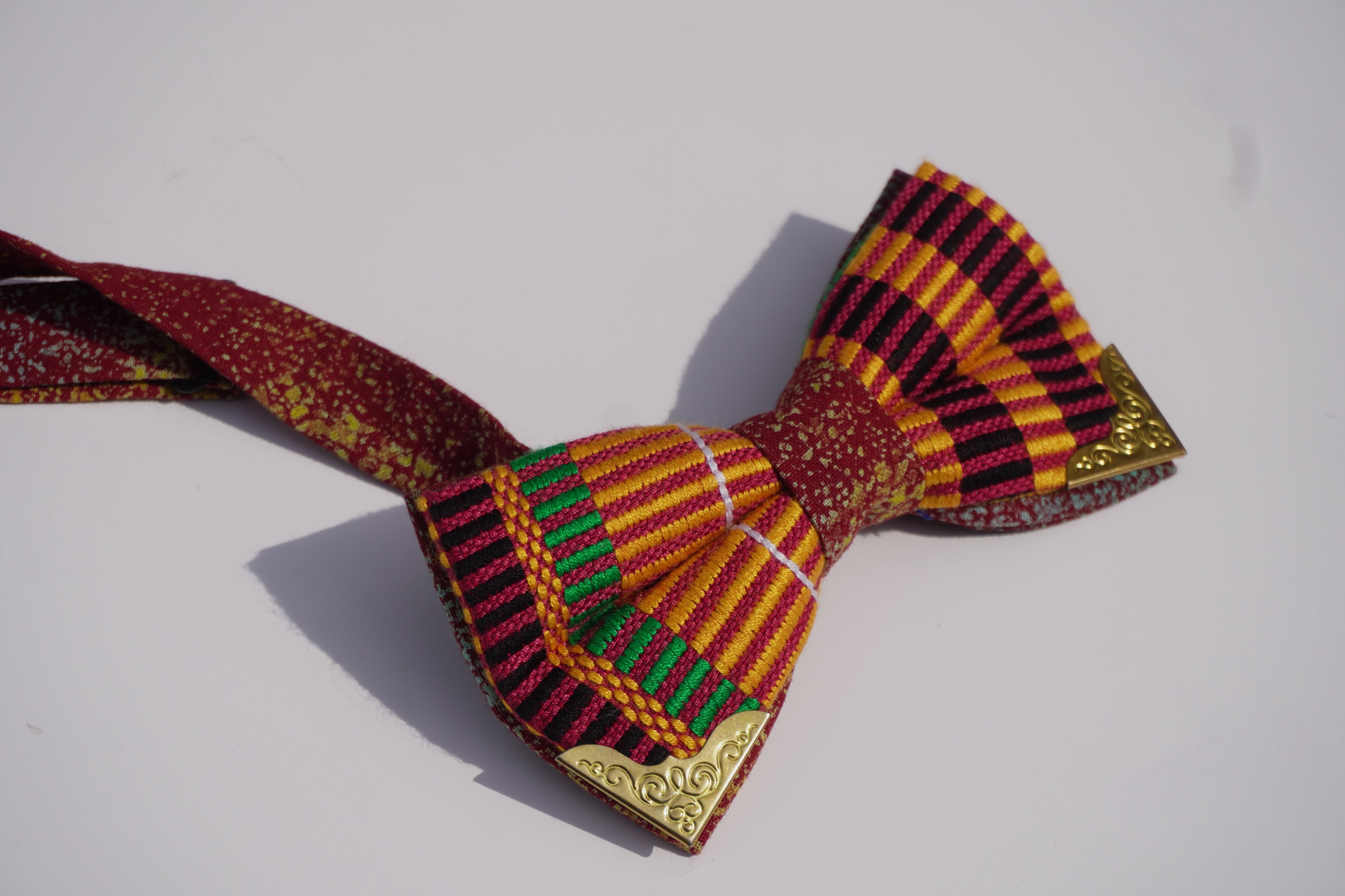 Gold tipped Kente Bow-tie made with authentic Ghana Kente
